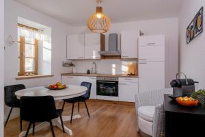 Kuchyň nebo kuchyňský kout v ubytování Apartment 2 Weide Zanthierhaus + 20 fotografií