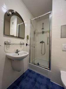 Kúpeľňa v ubytovaní Hotel Zlatý Býk