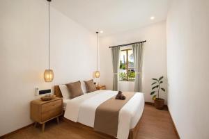 Posteľ alebo postele v izbe v ubytovaní Solak Villas + 13 fotografií