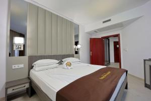 Voodi või voodid majutusasutuse Prestige Hotel and Aquapark - All inclusive toas