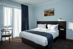 Ani Forest Hills Hotel and Resort, Dilijan客房内的一张或多张床位
