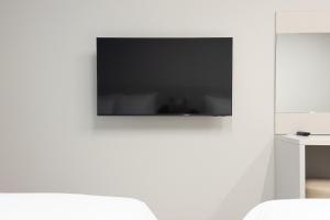 TV a/nebo společenská místnost v ubytování Hotel Wavellent Yangyang