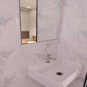 Koupelna v ubytování Hotel Pragati Inn