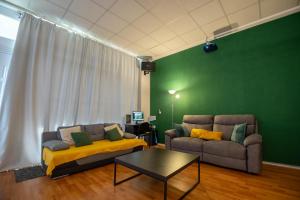 A seating area at Cinema Zeus Studios - by Avelink