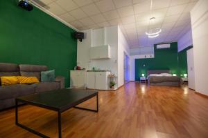 A seating area at Cinema Zeus Studios - by Avelink