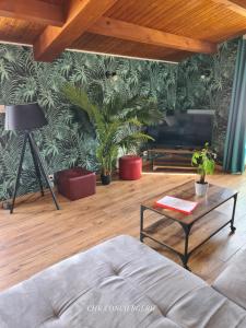 Posedenie v ubytovaní Le Bocage gîte 90m2 chaleureux à 4 min du Puy du Fou