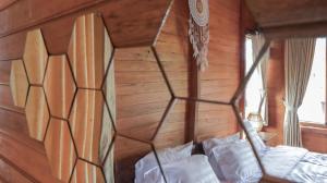 Postel nebo postele na pokoji v ubytování Nora Cottage