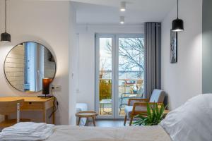 Postel nebo postele na pokoji v ubytování Apartamenty Belona Puck