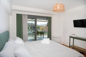 Ένα ή περισσότερα κρεβάτια σε δωμάτιο στο Luxury Sea View Apartment