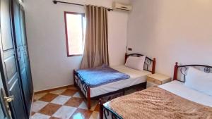 Postel nebo postele na pokoji v ubytování Residence Rosas
