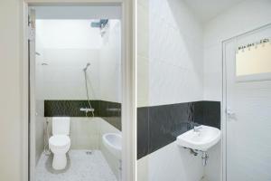 Koupelna v ubytování Krekot Residence Pasar Baru
