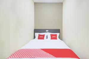 Postel nebo postele na pokoji v ubytování Krekot Residence Pasar Baru