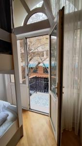 Postel nebo postele na pokoji v ubytování Gunel's Hostel Baku