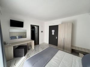 Voodi või voodid majutusasutuse Hotel Cocceio toas