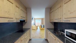 Köök või kööginurk majutusasutuses Les Mayens MB 011 - LUXURY apartment 6 pers