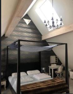 Ένα ή περισσότερα κρεβάτια σε δωμάτιο στο Altstadtloft am Kaulberg