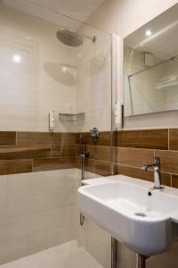 Koupelna v ubytování Hotel San Giorgio + 36 fotografií