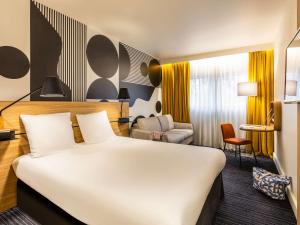 Postel nebo postele na pokoji v ubytování Mercure Metz Centre + 37 fotografií