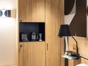 Kuchyň nebo kuchyňský kout v ubytování Mercure Metz Centre