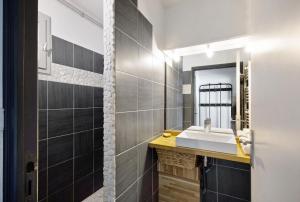 a bathroom with a sink and a mirror at Chalet Pla Del Mir in Les Angles +73 photos