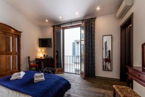 A bed or beds in a room at Medici Soderini