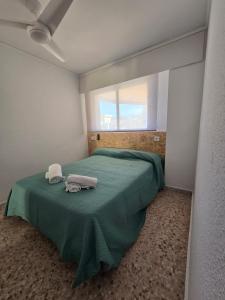 Postel nebo postele na pokoji v ubytování Family Vacations + 6 fotografií