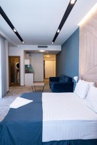 Postel nebo postele na pokoji v ubytování Rooftop Hotel + 33 fotografií