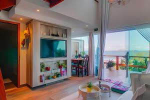 Μια τηλεόραση ή/και κέντρο ψυχαγωγίας στο Lofts Morro Mágico