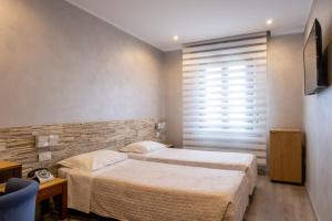 TV a/nebo společenská místnost v ubytování Hotel San Giorgio
