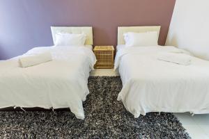 Ένα ή περισσότερα κρεβάτια σε δωμάτιο στο 2a豪华三层排屋6房6浴室家庭聚会结婚生日USM槟威大桥SPICE会展中心乔治市