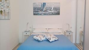 Postel nebo postele na pokoji v ubytování Apartments Daria