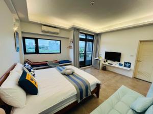 TV a/nebo společenská místnost v ubytování Sea Fun Homestay