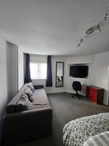 Ένα ή περισσότερα κρεβάτια σε δωμάτιο στο 1 Bedroom Apartment in Poole