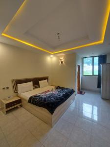 Postel nebo postele na pokoji v ubytování Farooq hotel