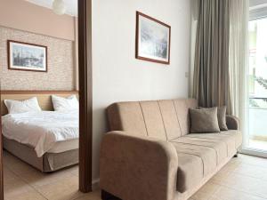 Postel nebo postele na pokoji v ubytování Agora Boutique Apart Hotel