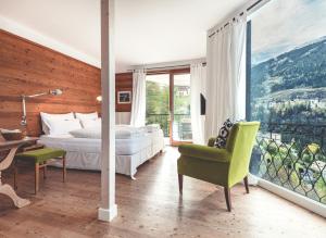 Postel nebo postele na pokoji v ubytování Alpine Spa Hotel Haus Hirt