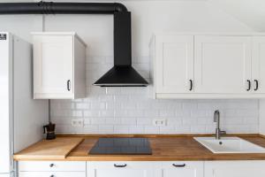 Dapur atau dapur kecil di Apartment with a large patio