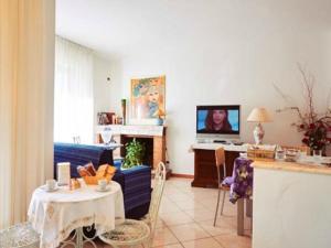 TV a/nebo společenská místnost v ubytování B&B Giu&Gio