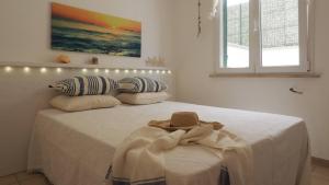 Postel nebo postele na pokoji v ubytování Villa del Mare 2 by Salentoaffitti