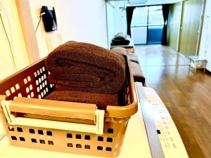 ゲストハウスＥn プレザント203的休息区
