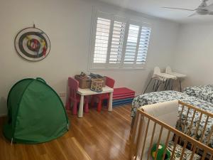 OneWorldLove Garden客房内的一张或多张床位