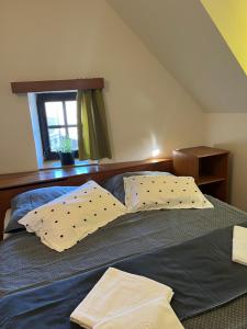 Postel nebo postele na pokoji v ubytování Apartmány BAROKO