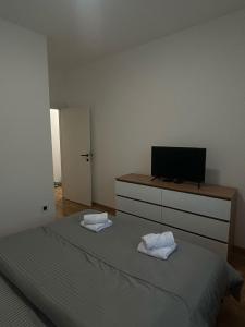 Postel nebo postele na pokoji v ubytování Bianco