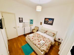 Postel nebo postele na pokoji v ubytování TURATI ROOMs