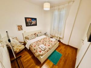 Postel nebo postele na pokoji v ubytování TURATI ROOMs