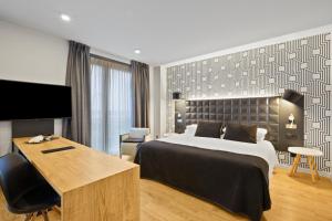 TV a/nebo společenská místnost v ubytování B&B HOTEL Tarragona Valls