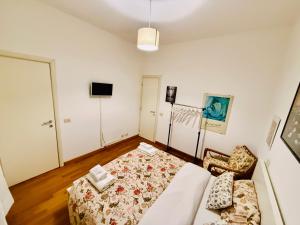 Postel nebo postele na pokoji v ubytování TURATI ROOMs