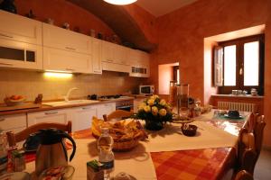 Кухня или кухненски бокс в B&B La Casa Di Tocco