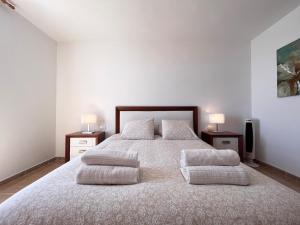 Una cama o camas en una habitación de Casa Alpine - 2 bedroom apartment with large terrace