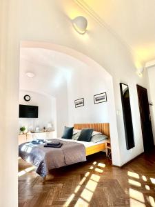Posteľ alebo postele v izbe v ubytovaní Apartmány Nerudova 36